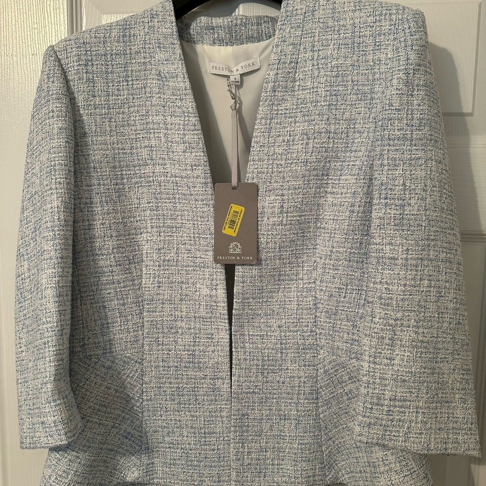 Elegant two pieces suit jacket and skirt tweed fabric fully lined new with tag.